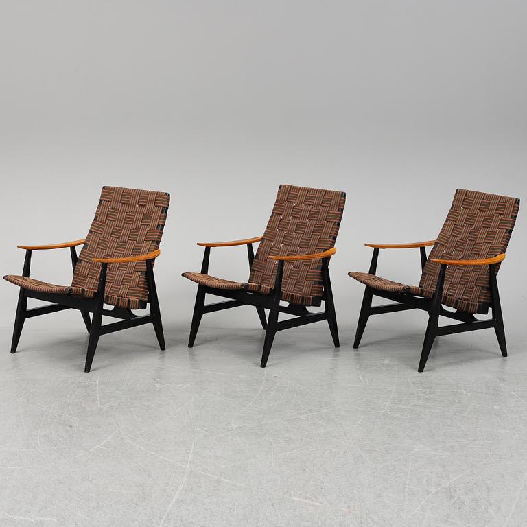 A set of three 1950's easy chairs.