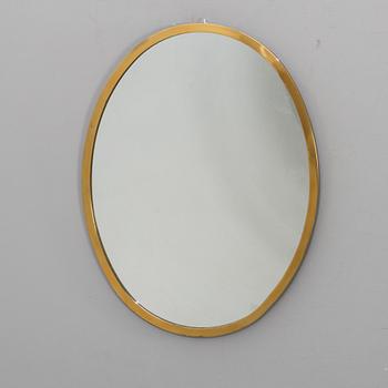 A 20th century brass mirror.