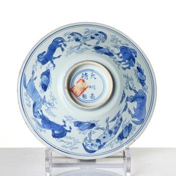 A blue and white 'eight horses of Muwang' bowl, Qing dynasty, Shunzhi period, mid 17th century.