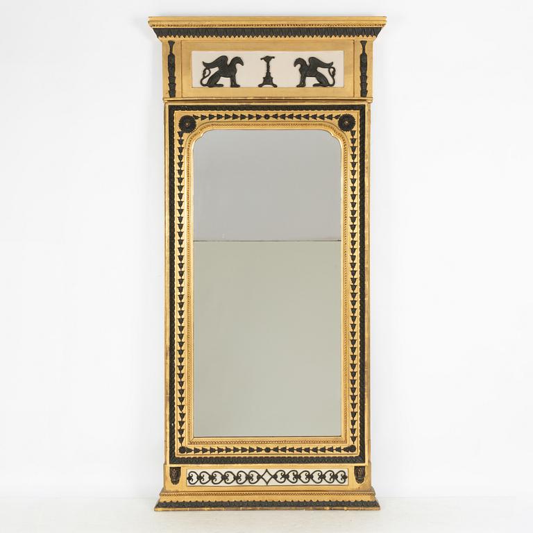 A Swedish Empire giltwood and bronzed mirror attributed to Jonas Frisk (master in Stockholm 1805-24).