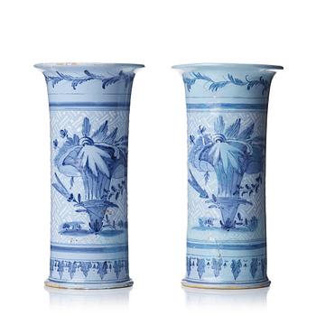 245. A pair of trumpet shaped Swedish faience vases, mid 18th Century.