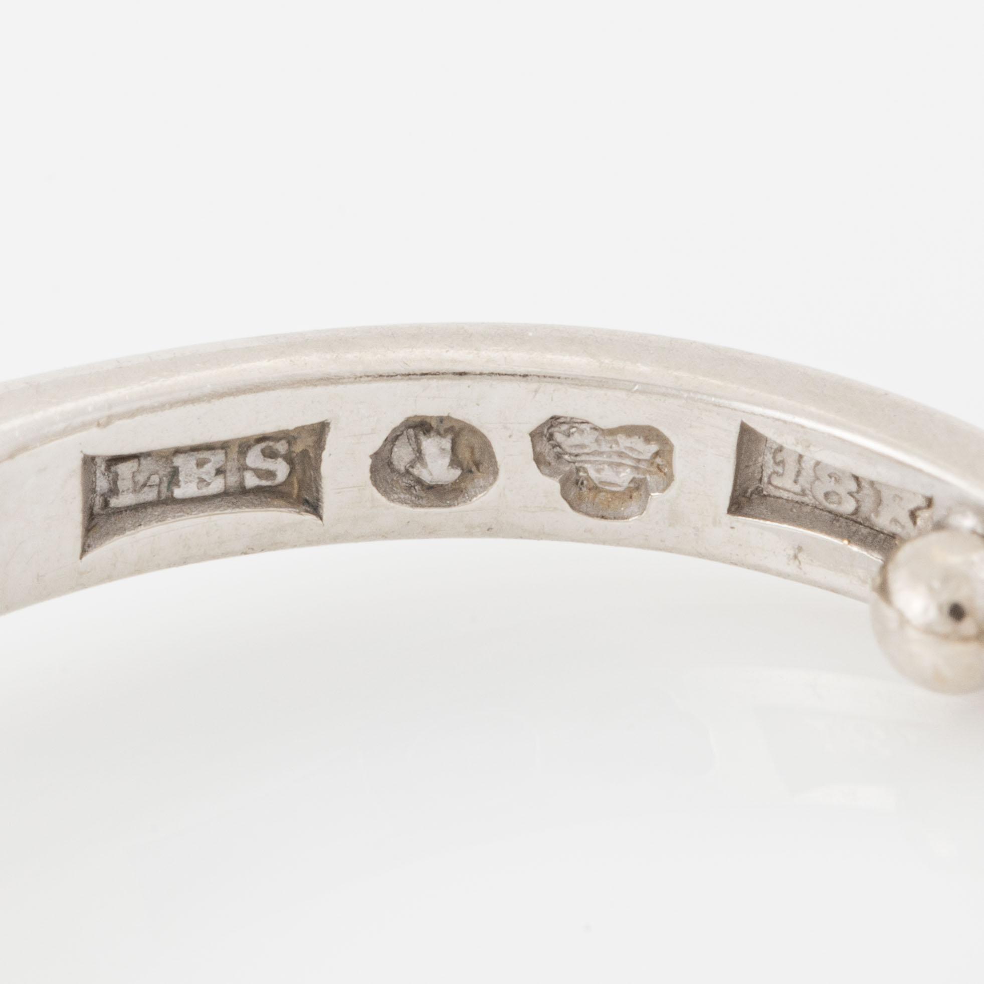 Ring, enstensring, 18K vitguld med briljantslipad diamant.