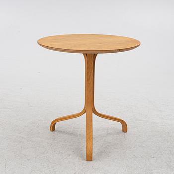 Yngve Ekström, a 'Lamino' armchair with ottoman and sidetable, Swedese, Sweden, 21st century.