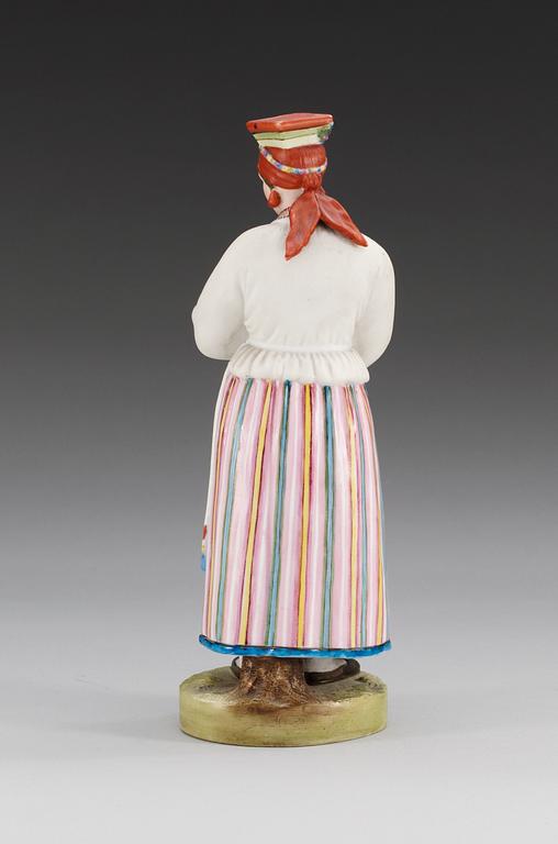 A Russian figure of a peasant woman from the Voronezh province, Gardner manufactory, ca 1900.