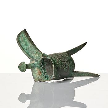 A bronze ritual wine vessel, jue and a bowl, possibly Shang and Ming dynasty.