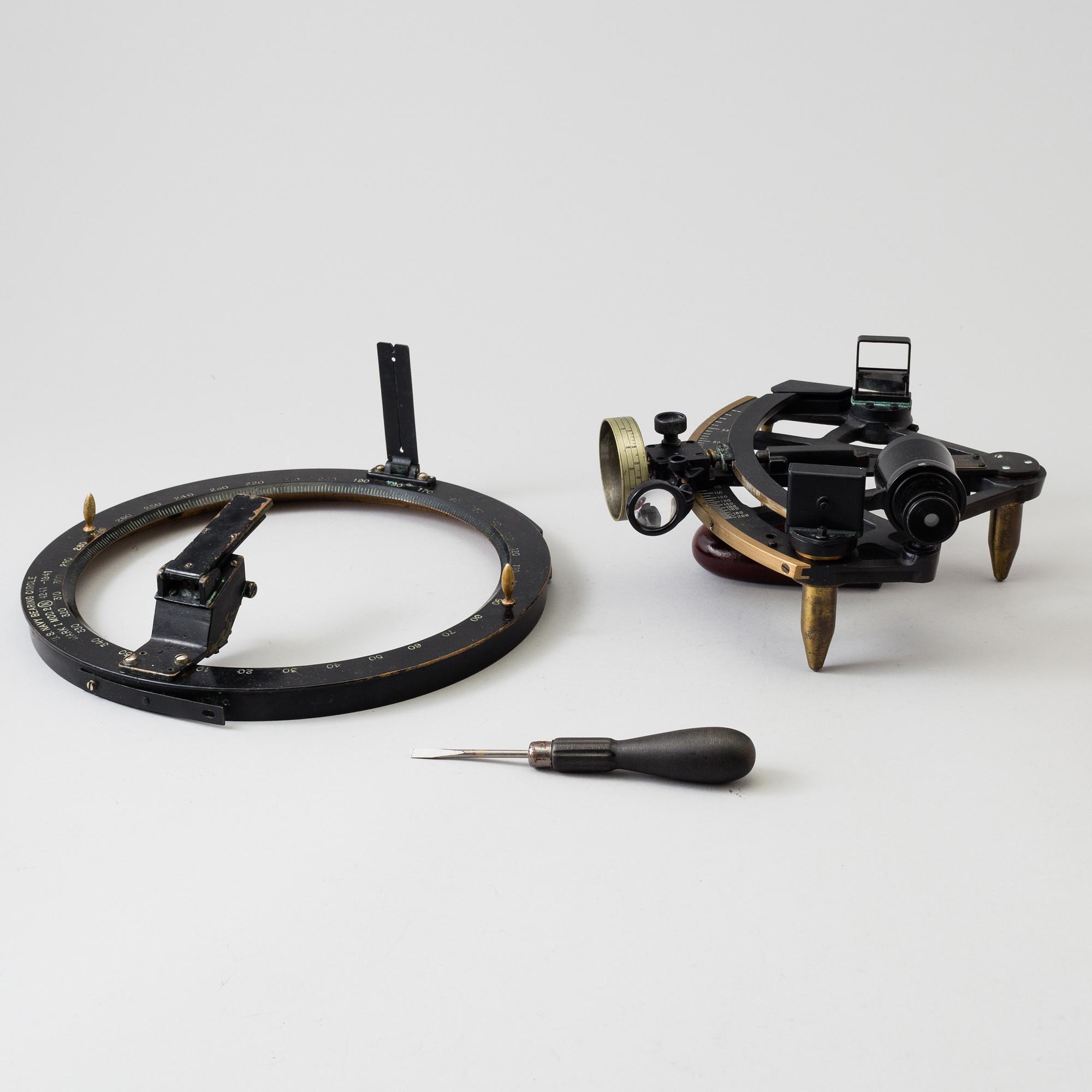 A 20th century Stadimeter and a bearing circle, both in cases. Marked U.S. Navy.