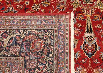 A Kashmar carpet, approx. 387 x 297 cm.