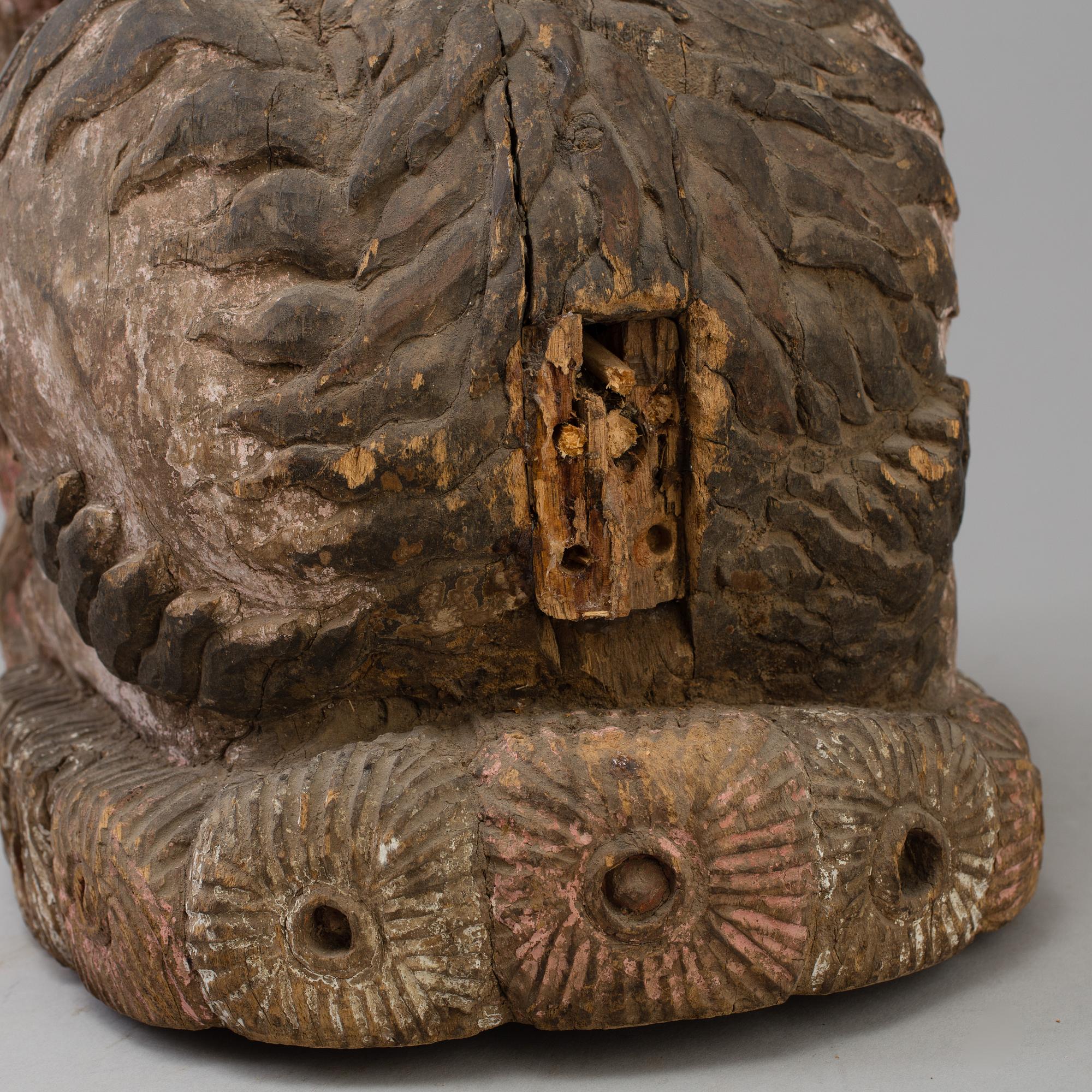 A wooden mythical beast, Southeast Asia, early 20th Century.
