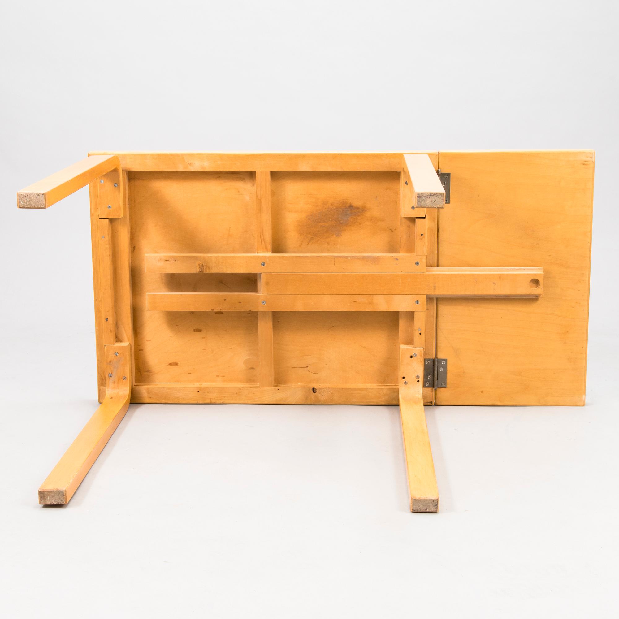 A mid-20th century drop leaf table for Artek Finland.