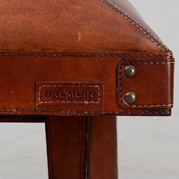 A contemporary dressing table with stool.