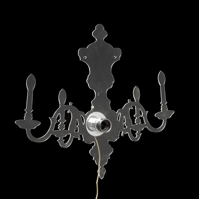 A Ligne Roset 'Louis 5D' wall light by Blandine Dubos.