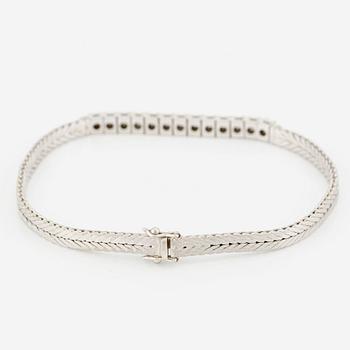 Bracelet in 18K white gold with brilliant-cut diamonds.