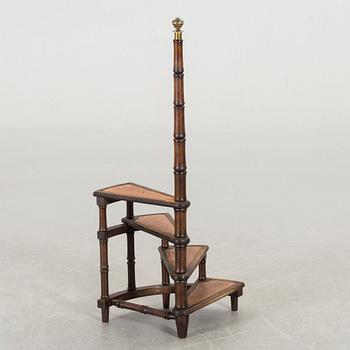 A Mahogany library ladder.