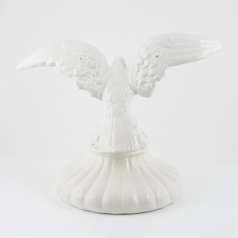 Dekorelement till kakelugn, flintgods, 1900-talets första hälft.