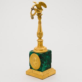 A Russian gilt bronze and malachite watch stand, first half of 19th Century.