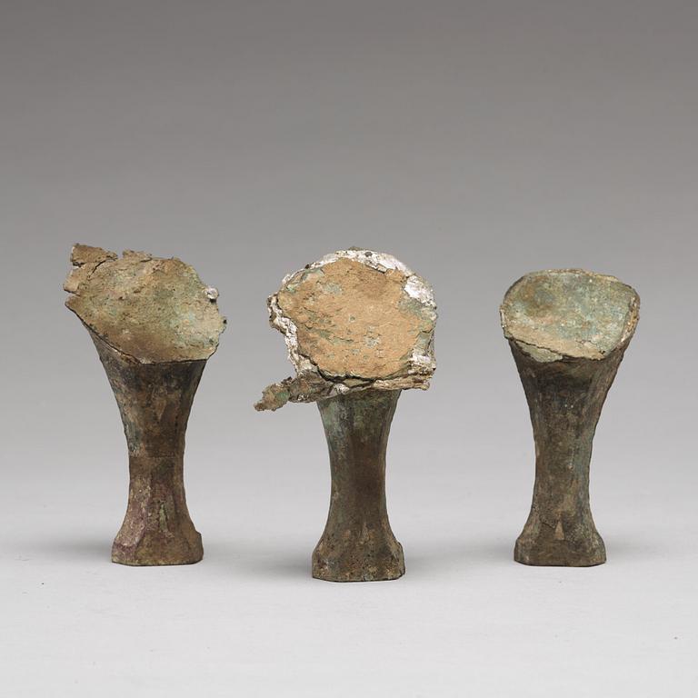 A bronze tripod food vessel and cover, "Ding", Eastern Zhou Dynasty.