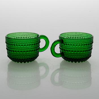 A set of 12 punch cups in glass "Kastehelmi" by Oiva Toikka, Arabia. Finland.