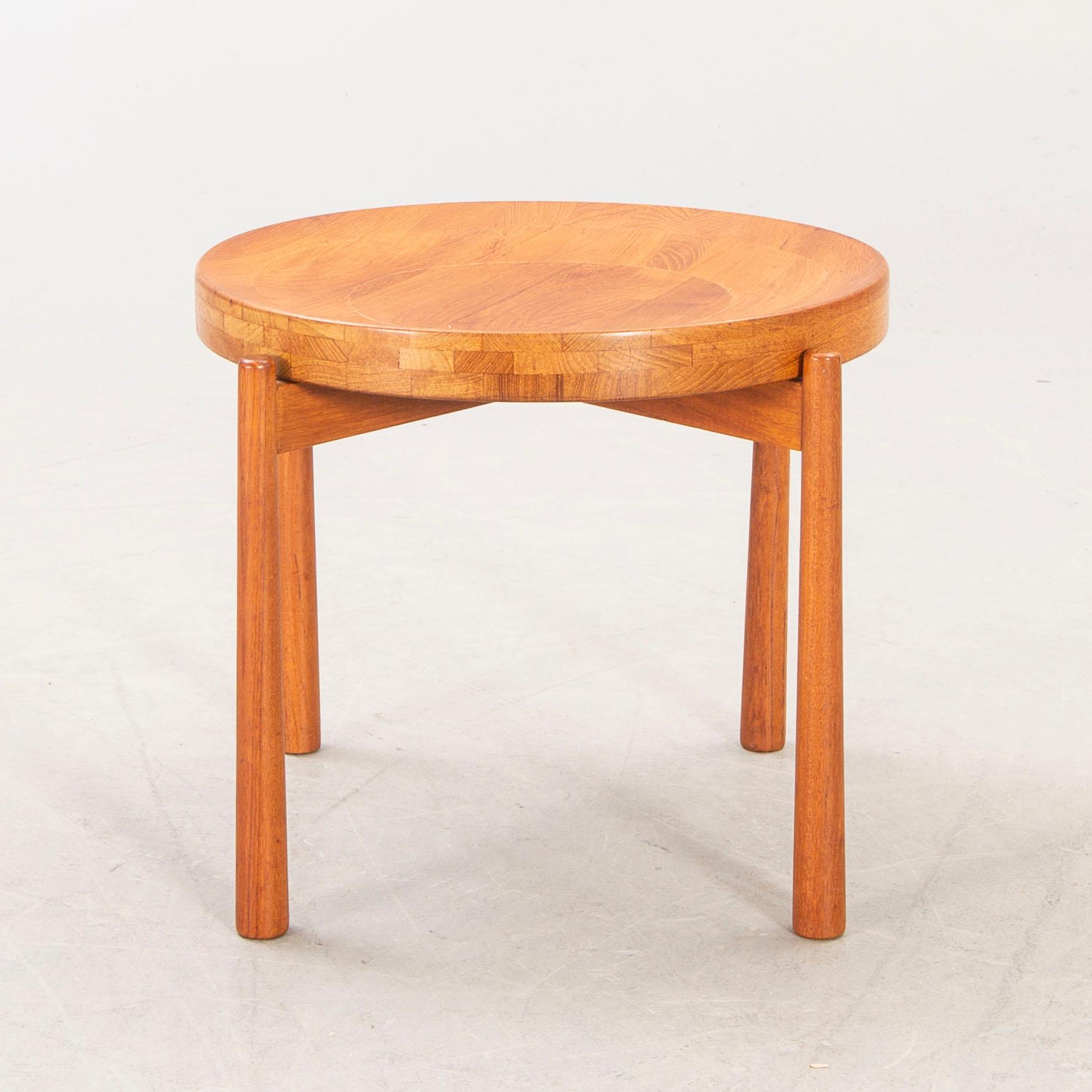 A Jens Quistgaard teak table mind 1900s.