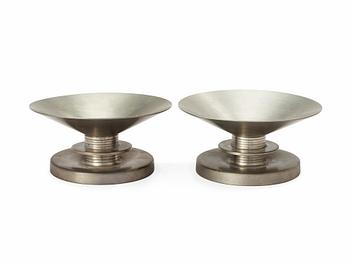 547. A pair of Sylvia Stave pewter candlesticks by CG Hallberg 1933.