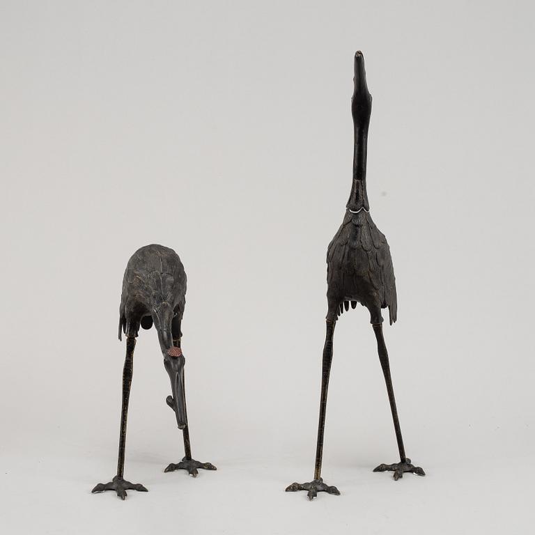 A pair of Chinese metal cranes, first half of the 20th century.