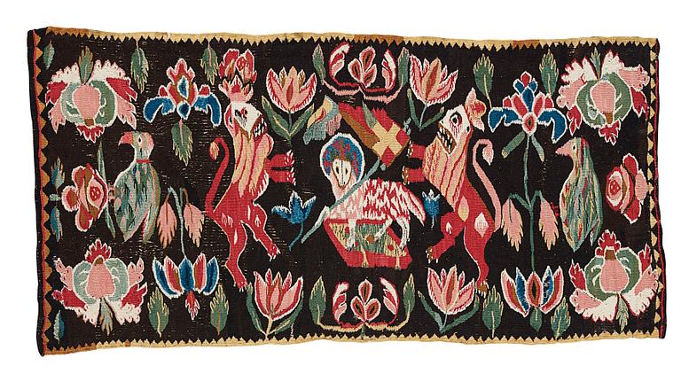 A CARRIAGE CUSHION, tapestry weave, ca 48-51,5 x 98-99 cm as well as fringes, Scania, Sweden, late 18th century.