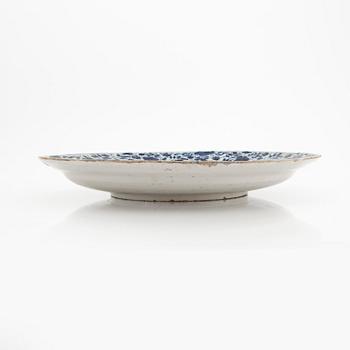 A Persian 17th/18th blue and white faience dish.