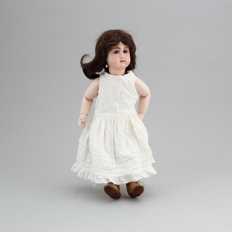 A Jullien Jeune bisque head doll.