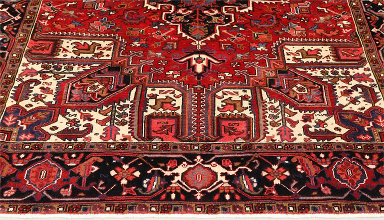 A carpet, Heris, c. 347 x 230 cm.