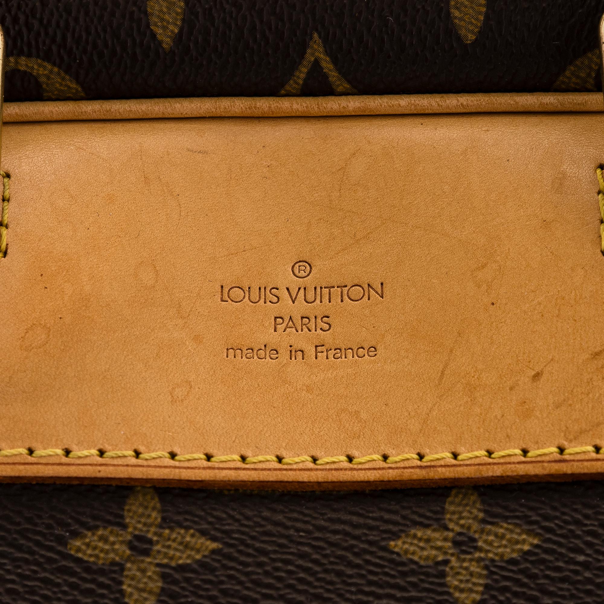 Louis Vuitton, a Monogram Canvas 'Evasion' weekend bag.