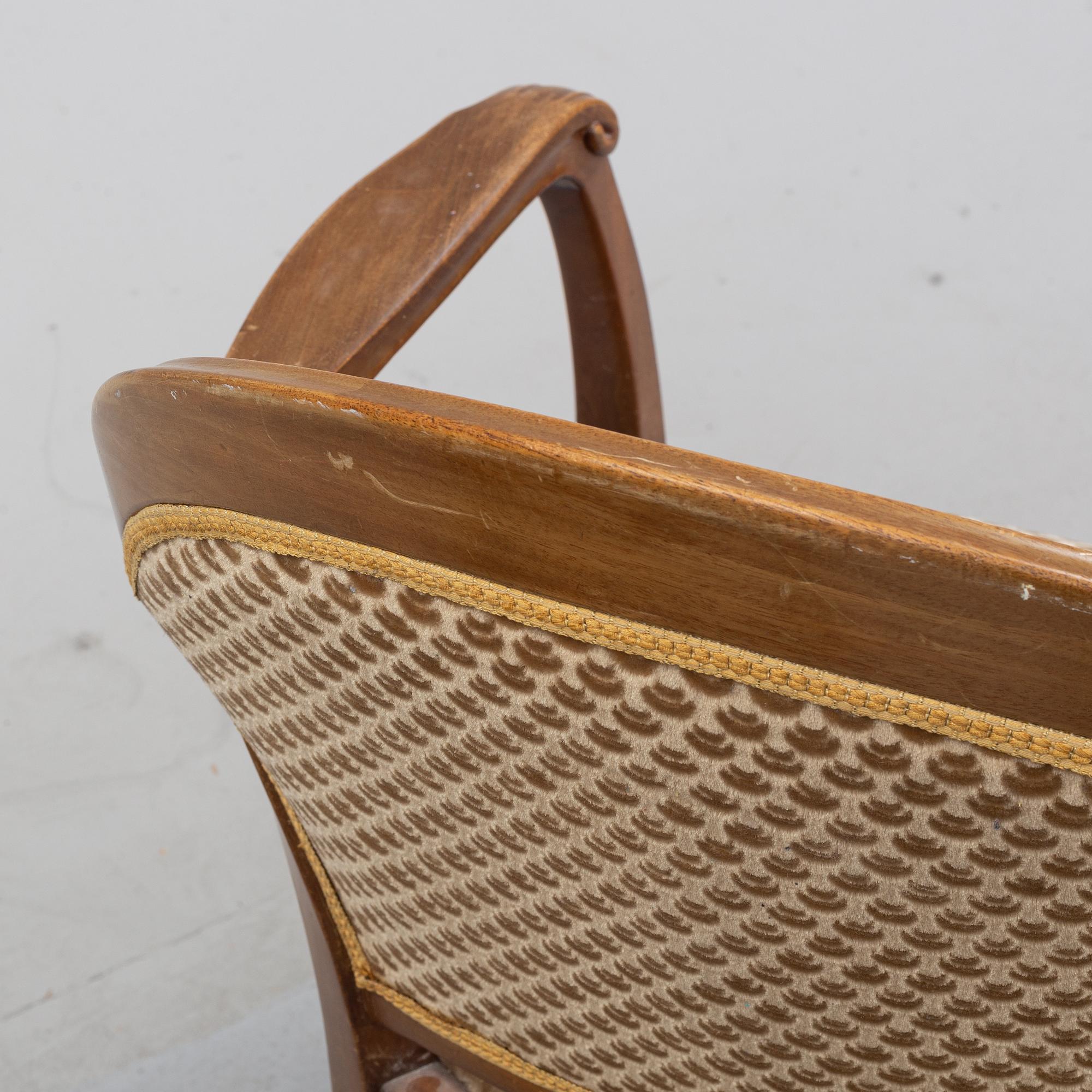 A pair of art noveu armchairs, early 20th Century.