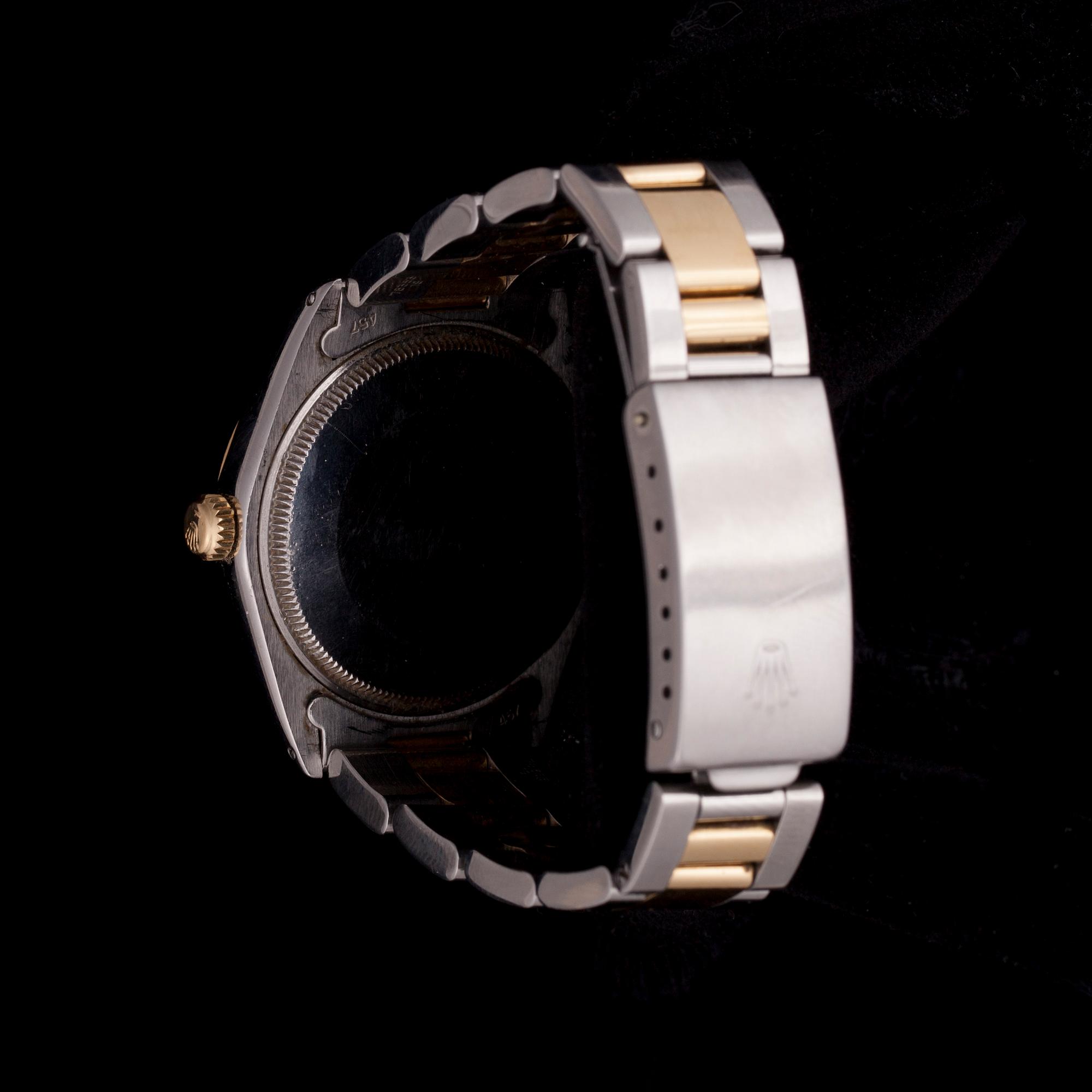 RANNEKELLO, miesten, Rolex Oyster chronometer. Terästä ja kultaa. 1900-luvun loppu.