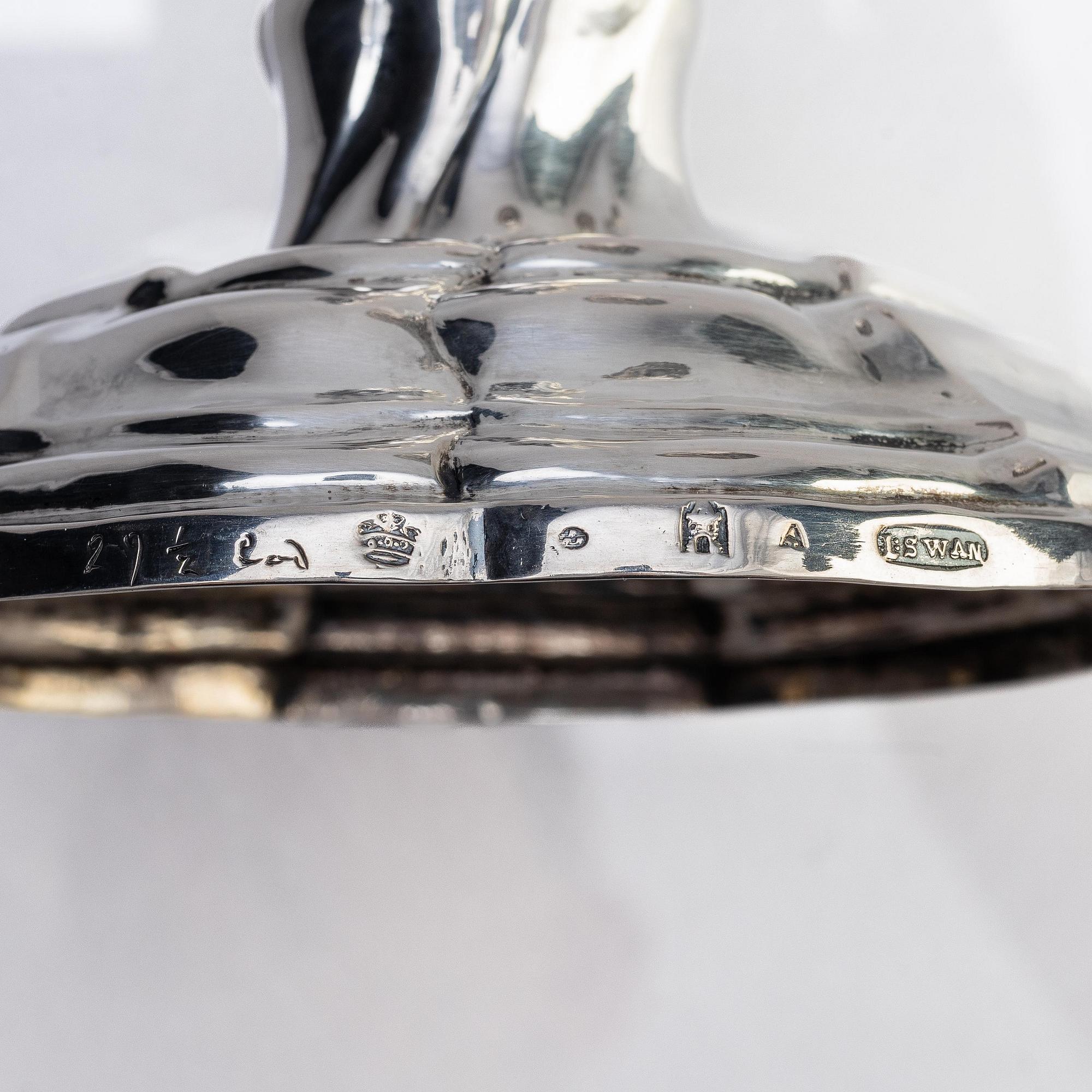 A pair of Swedish silver candlesticks, marks of Lorenz Swan, Nyköping 1759.