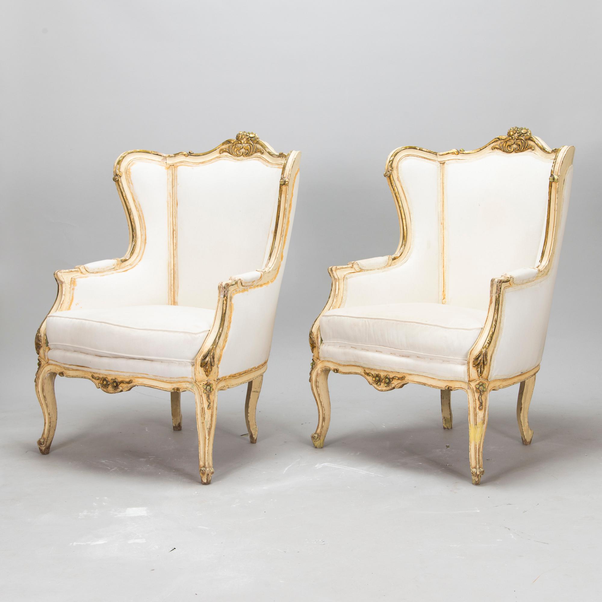 A pair of louis quinze style bergerer armchairs, first part of the 20th century.