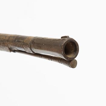 A snaphaunce gun, 19th Century.