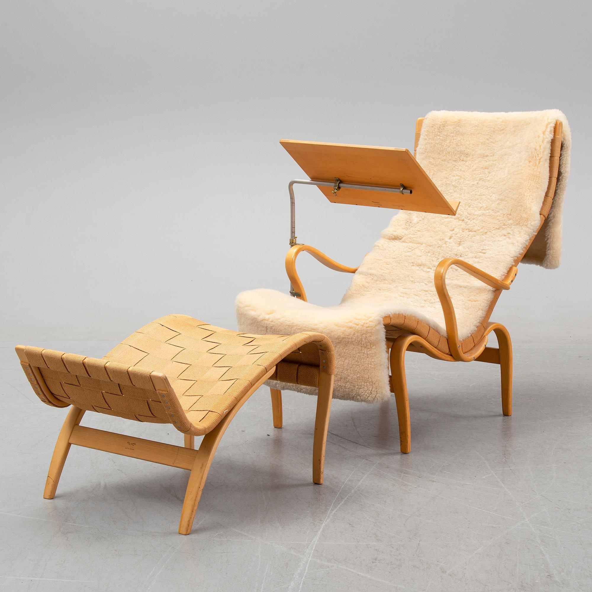 Bruno Mathsson, a 'Pernilla' armchair and a stool, Karl Mathsson, Värnamo, 1950's/60's.