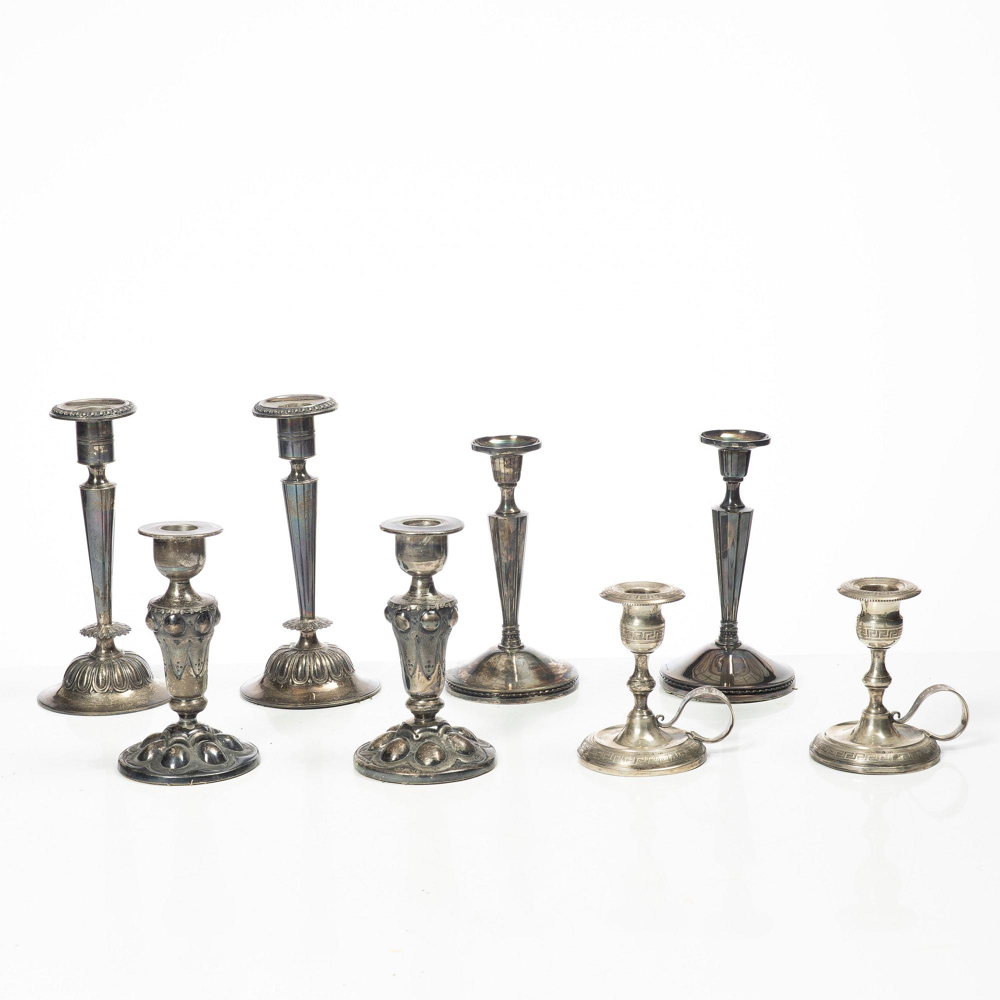 Four pairs och Swedish silver candlesticks, 19th-20th century.