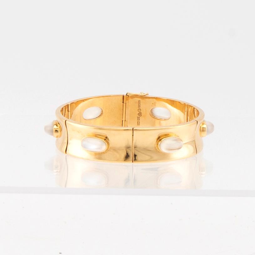 Armband 18K guld samt cabochonslipade månstenar Olle Torrestad Halmstad 1962.