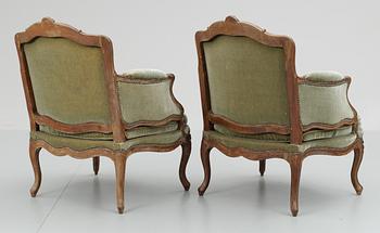 A pair of Louis XV 18th century bergeres. Stamped "P ROUSSEL", with inventory number and labeled  "Monsieur Villeboeuf".