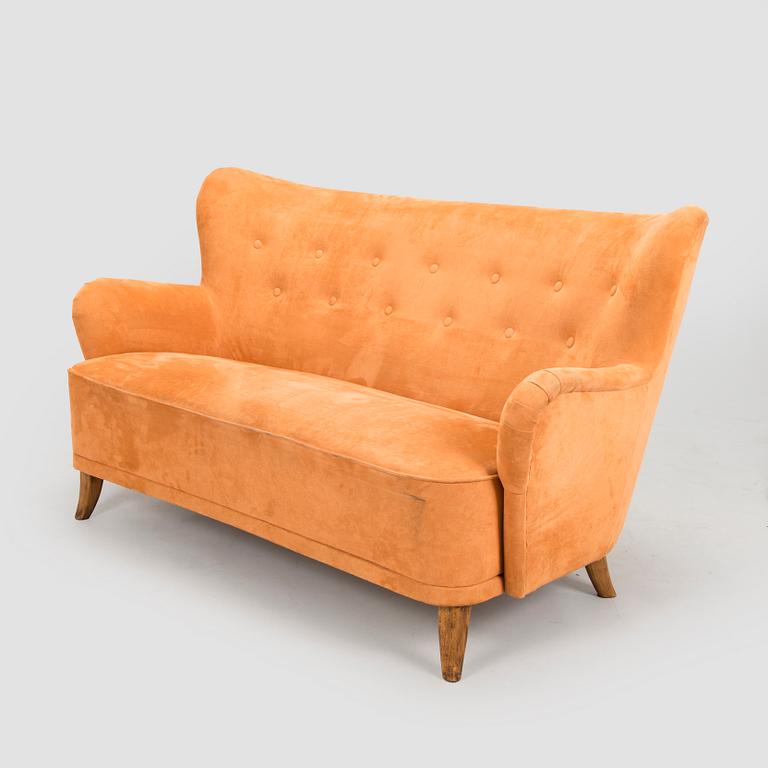 A mid-20th century sofa.