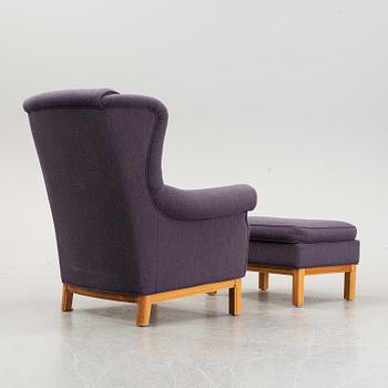 Easy chair and foot stool by Arne Norell, late 20th century.