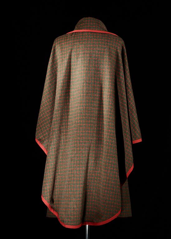 A wool cape and divided skirt by Celine.
