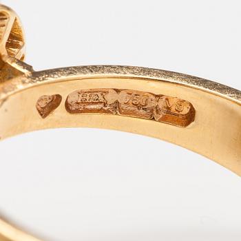 An 18K gold ring "Catherine Jagiellon" with diamonds ca 0.37 ct in total and topazes. Ofelia Jewelry, Helsinki 1998.