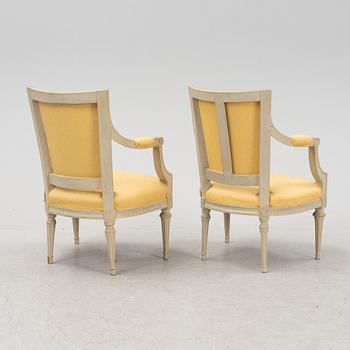 A matched pair of Gustavian armchairs, one signed by Johan Lindgren Stockholm.