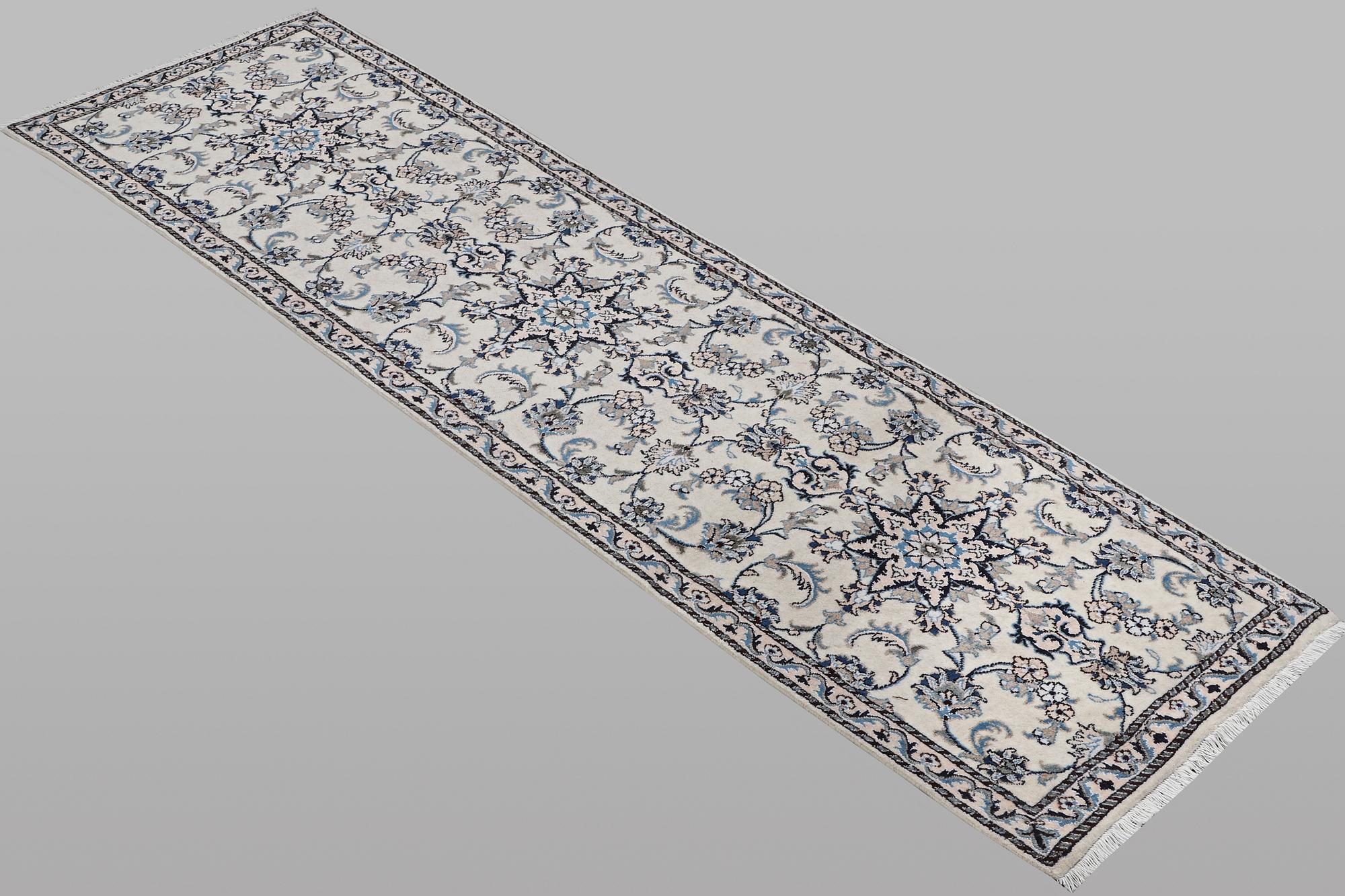 A runner carpet, Nain, part silk, ca 289 x 79 cm.