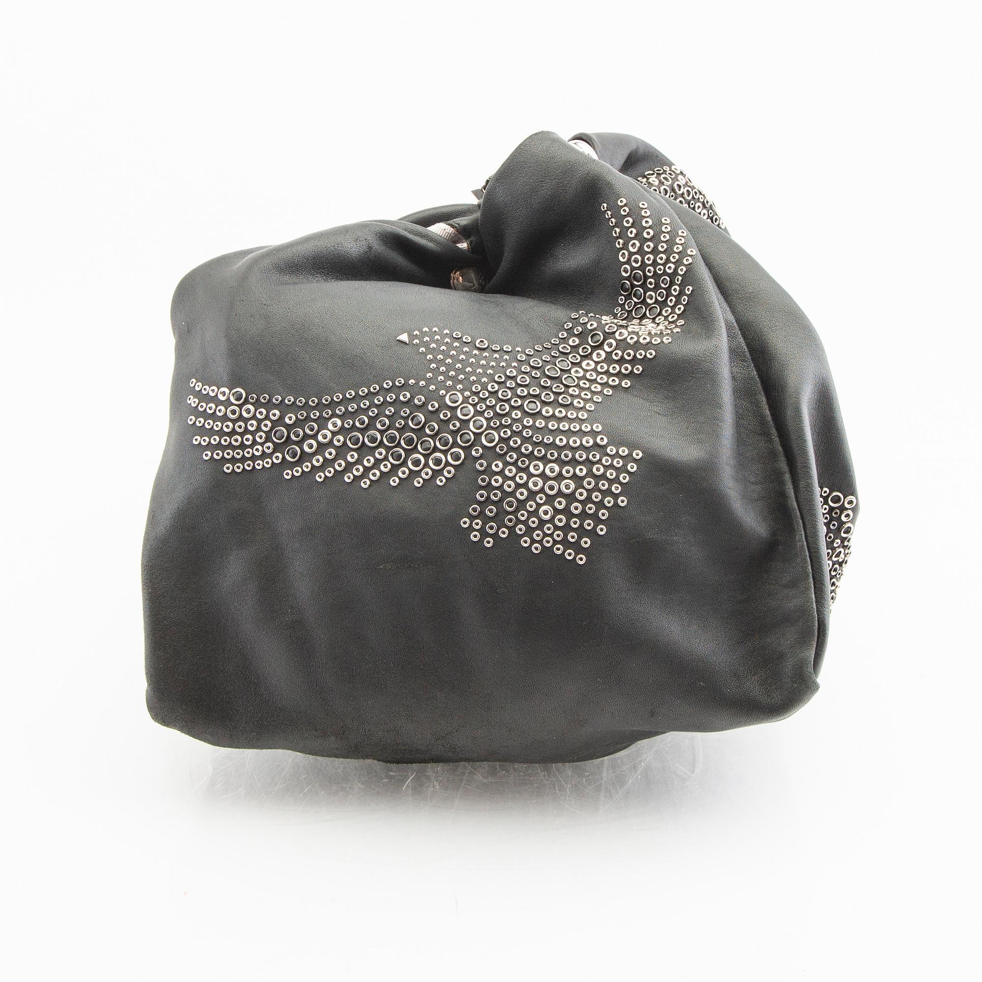 A Jimmy Choo leather handbag.