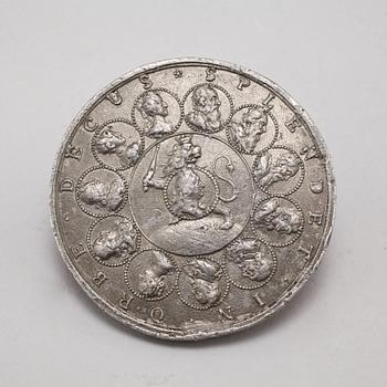 Two pewter medallions, 18th century.
