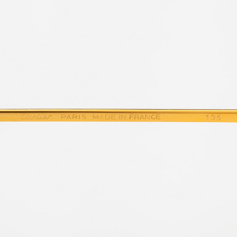 must de Cartier, Santos, a pair of eyeglass frames. Marked Cartier, Paris, Made in France 135, 56, 16.