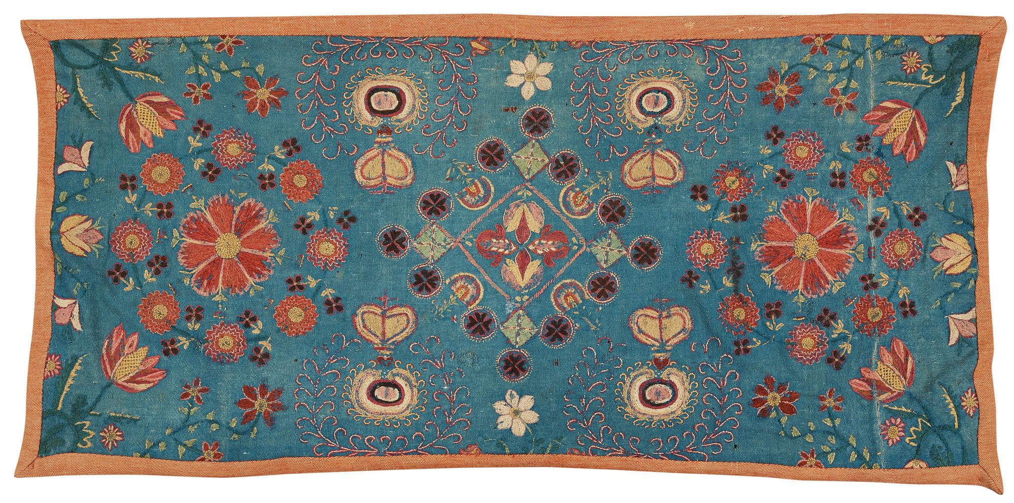 A CARRIAGE CUSHION, embroidered. "Blomsterdyna". 54 x 110 cm. Skåne (Scania, southern part of Sweden) around 1800.