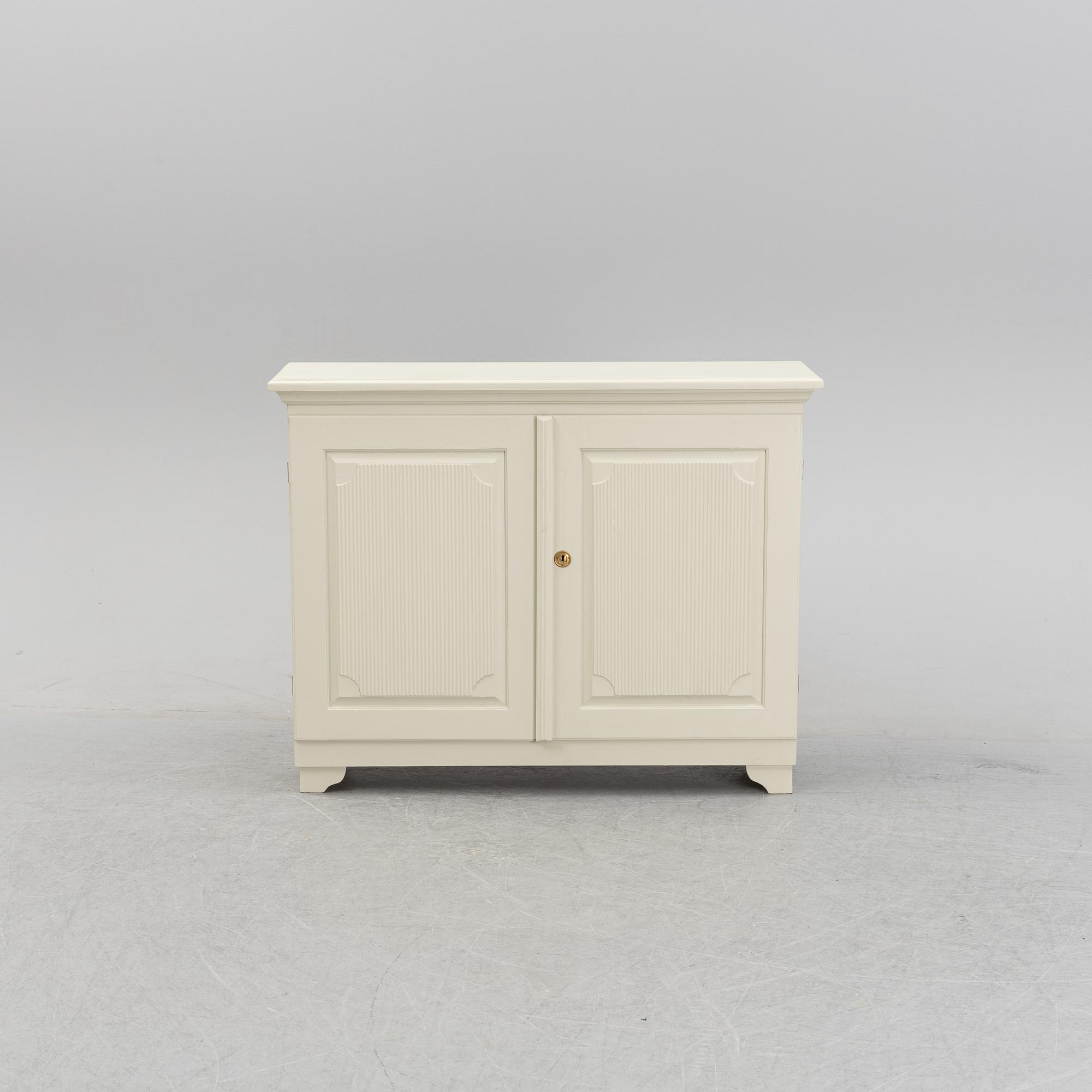 A painted 20th Century cupboard.