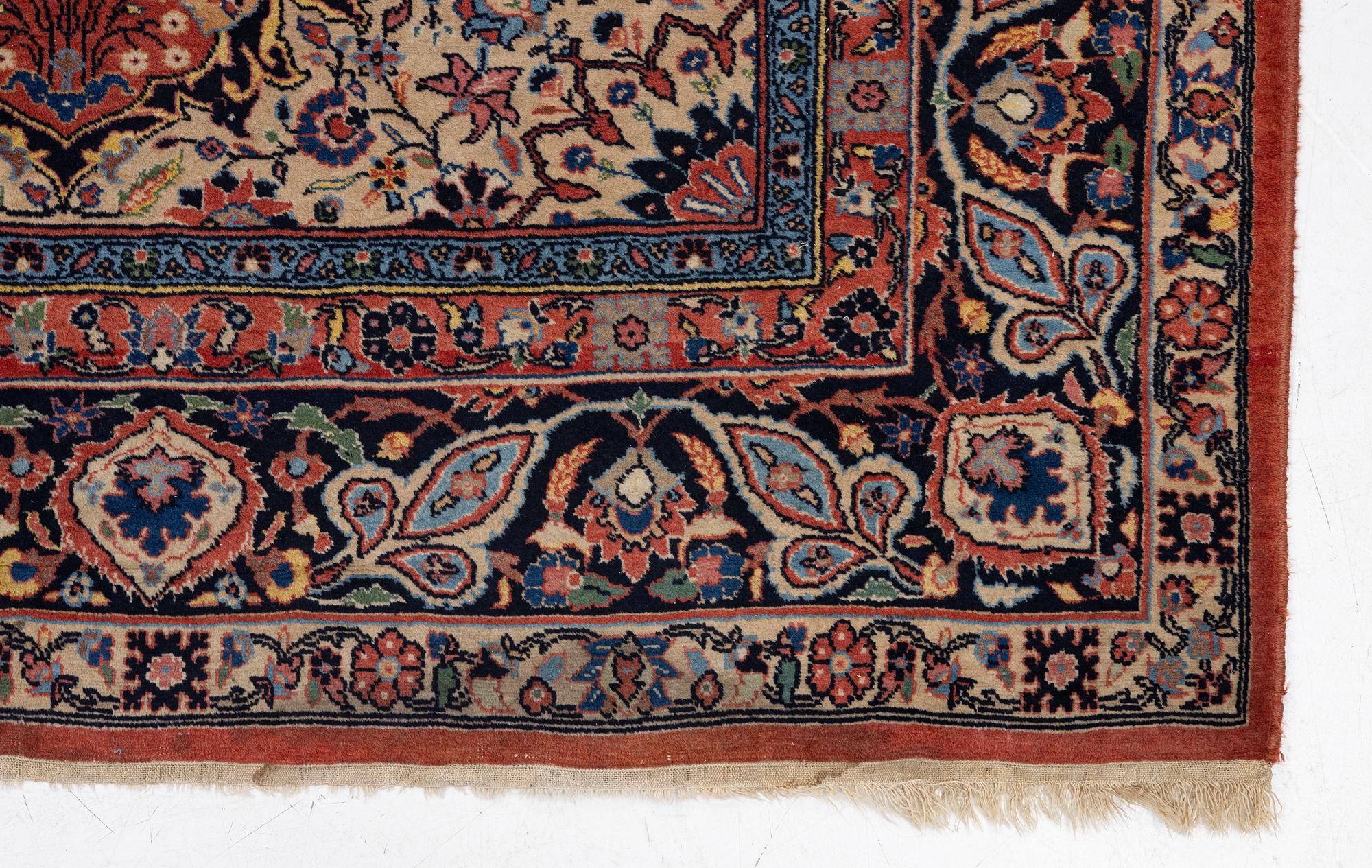 An oriental carpet, c. 370 x 275 cm.